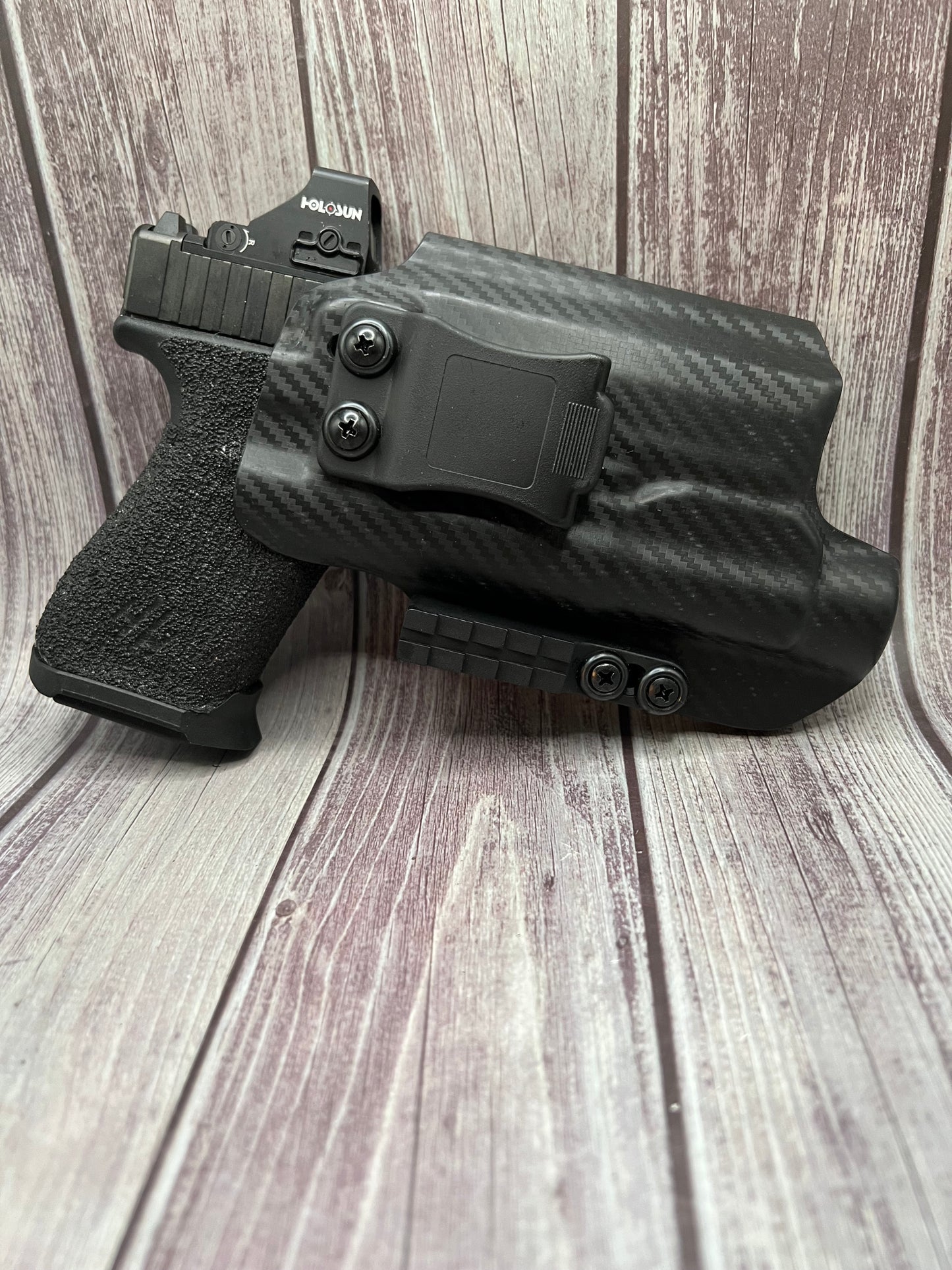 Light Bearing IWB Holster for Glock 19/19X/45 Pistol.