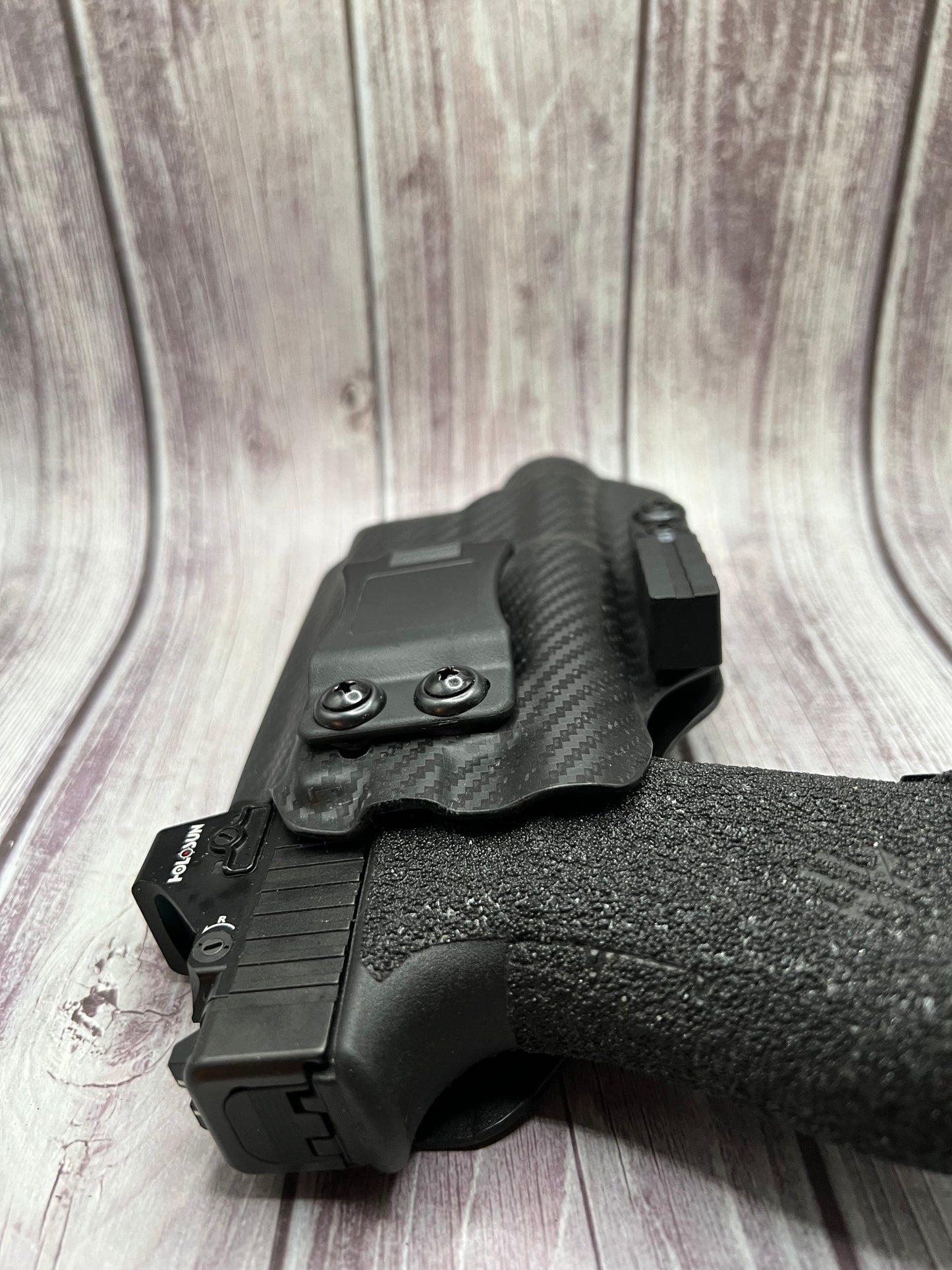 Light Bearing IWB Holster for Glock 19/19X/45 Pistol.