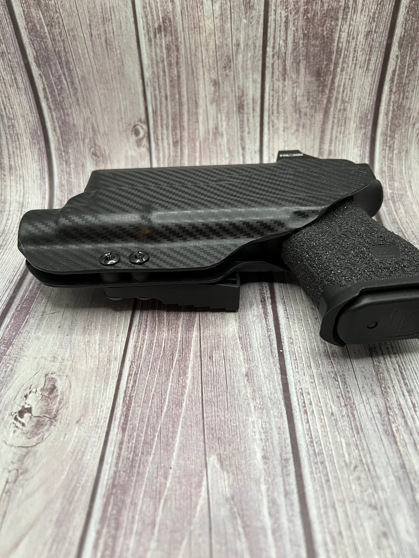 Light Bearing IWB Holster for Glock 19/19X/45 Pistol.